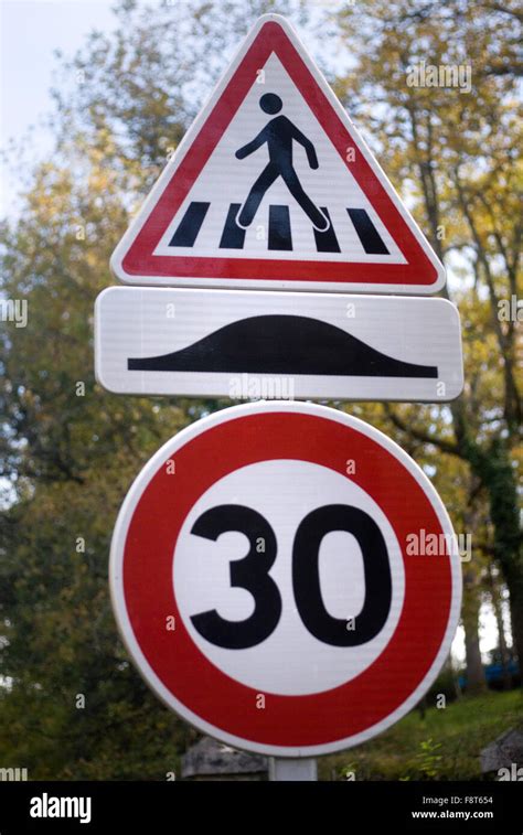 Speed Bump Speed Limit And Crossing Signs France Stock Photo Alamy