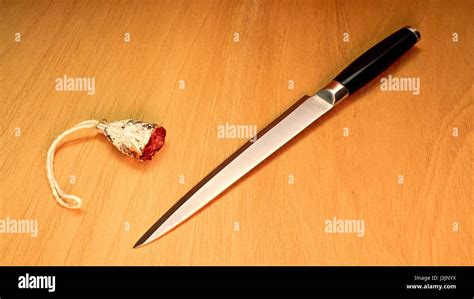 Knife And Salami On Wooden Board Stock Photo Alamy