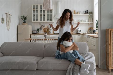 premium photo angry woman mother blaming scolding sad girl daughter