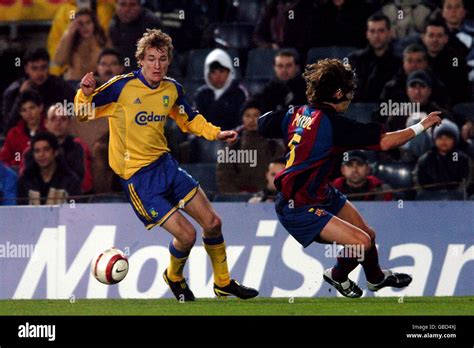 Brondbys Thomas Kallenberg L Takes On Barcelonas Carles Puyol Hi Res