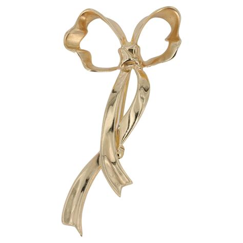 Tiffany And Co Ribbon Bow Brooch In 18 Karat Yellow Gold For Sale At