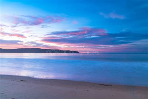 Dawn at the Beach with Clouds Stock Image - Image of seascape, sunrise ...