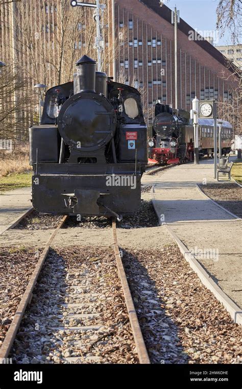 Vertical Shot Of An Old Vintage Exposition Locomotive In The Rataje