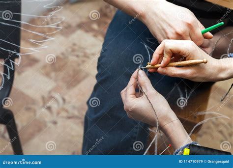 A Woman Is Sewing Beads On A Transparent Fabric Stock Image Image Of