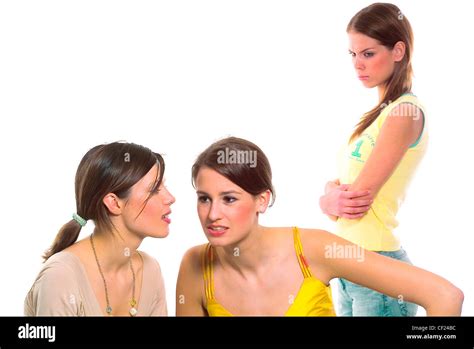 Female Brunette Hair Tied Up Wearing Yellow Strappy Top Sitting Listening To Female Long