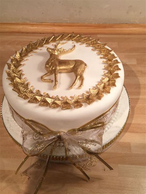 Rich Fruit Cake Decorated With A Gold Edible Stag And Gold Ivy Leaves