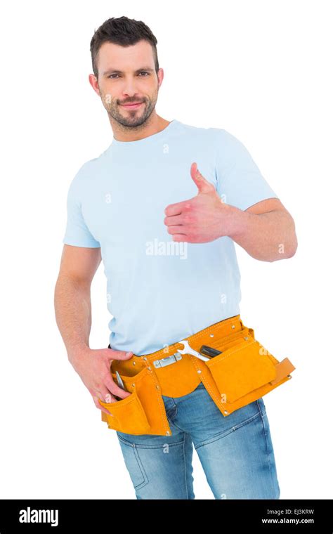 Handyman Wearing Tool Belt With Thumbs Up Stock Photo Alamy