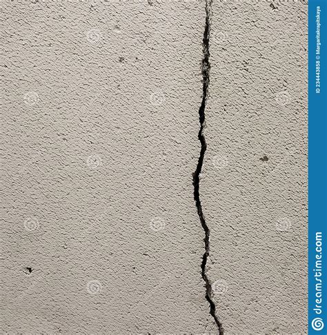 Damage In The Gray Concrete Wall Vertical Crack Close Up Stock Photo