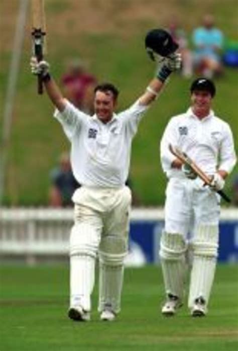 Craig McMillan celebrates his century | ESPNcricinfo.com