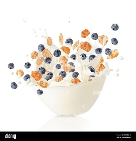 Cereal Corn Flakes And Blueberries Falling Into Bowl With Milk Splash