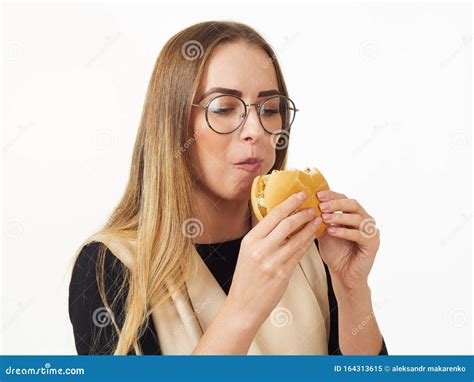 Girl Eating A Burger On A White Background Stock Image Image Of Girl