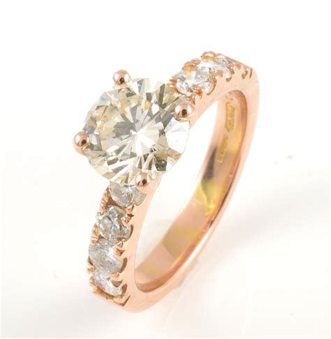 18ct rose gold brilliant cut diamond single stone ring with diamond ...