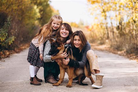 Mother with kids and dog in an autumn park – PAWSitively Natural Pet ...