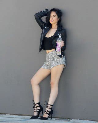 Carmireli Cleavy And Leggy Wearing Black Belly Top And Shorts At The Photoshoot Porn Pictures