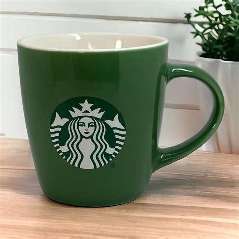 Emblem With Starbucks Coffee Mugs
