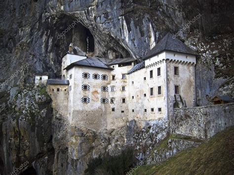 Predjama castle in the cave, slovenia — Stock Photo © tommasolizzul ...