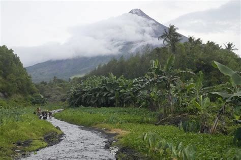 Thousands Evacuated As Philippine Volcano Spews Ash Rocks