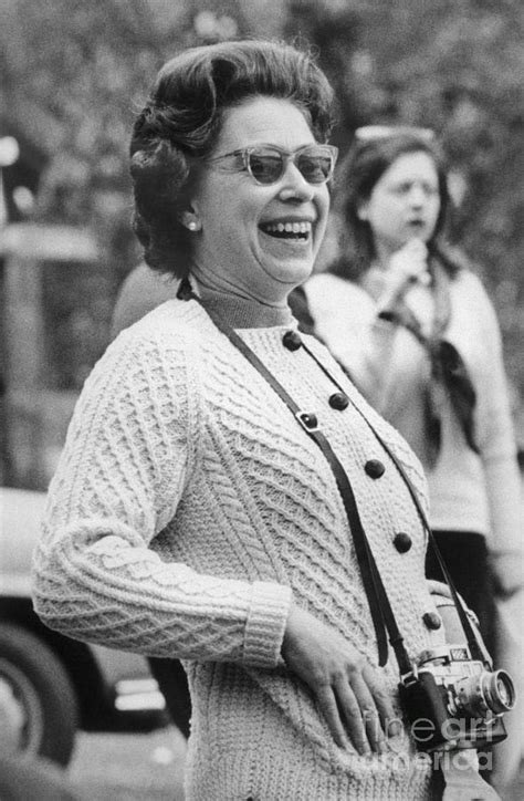 Queen Elizabeth In Sunglasses Laughing by Bettmann