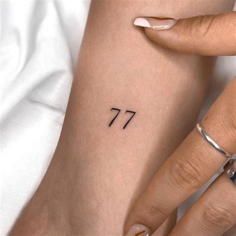 Number Tattooed On The Inner Arm