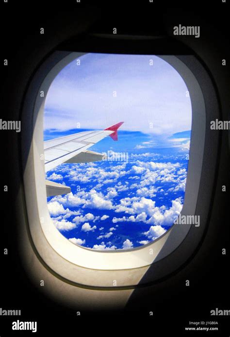 Airplane window view Stock Photo - Alamy