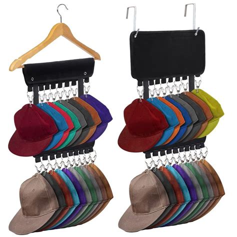 several hats hanging from hooks on a rack