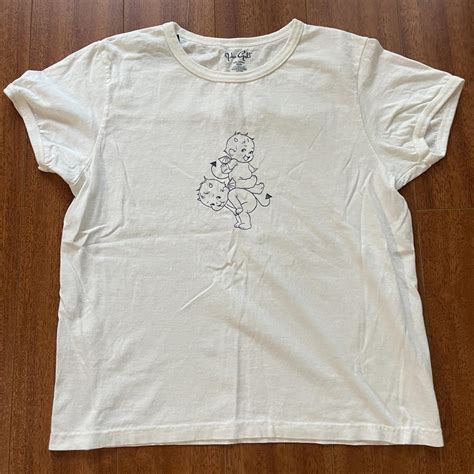 White Brandy Melville Devil Baby Cherub Graphic Depop