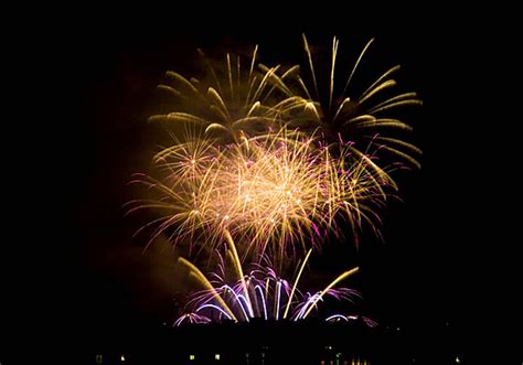 Fireworks Lighting Up The Sky Flame Night Lit Photo Background And