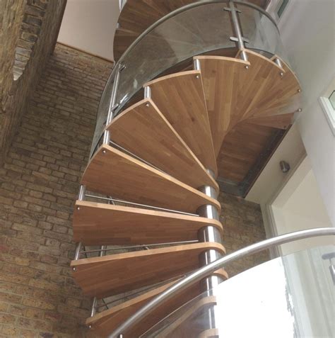 Decorative Metal Solid Wood Spiral Stairs With Glass Railing Design Spiral Stairs And Steel