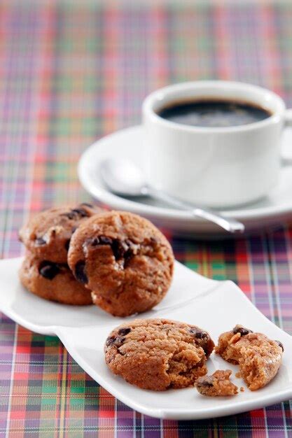 Premium Photo High Angle View Of Cookies With Coffee On Table