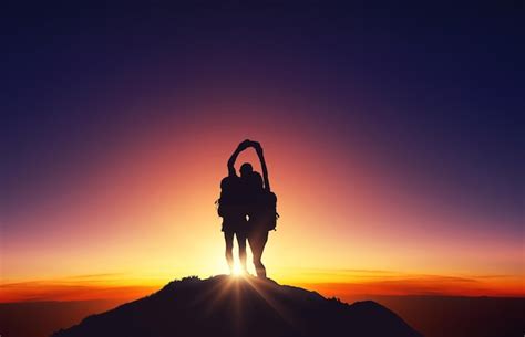 Premium Photo Silhouette Man Standing On Cliff Against Dramatic Sky