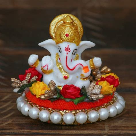 Polyresin Statue Of Ganesha With Pearl Design Decorative Showpiece