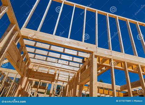 A New Build House with a Wood Beam Stick Framework is Constructed in ...