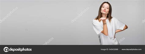 Brunette Woman Blowing Kiss While Standing Hand Waist Isolated Grey Stock Photo Ischukigor