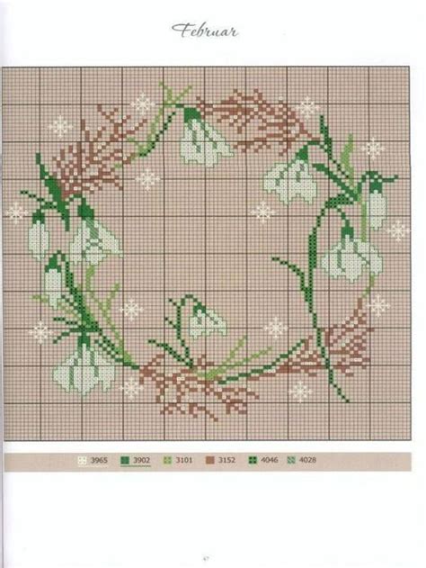 A Cross Stitch Pattern With Flowers And Leaves On The Bottom In Green