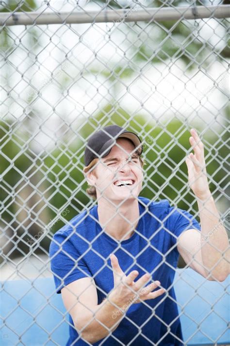 Young man watching a sports game and screams Stock Photo by ©wernerimages 61736707