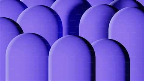 A row of purple oval shaped objects on a purple background photo ...