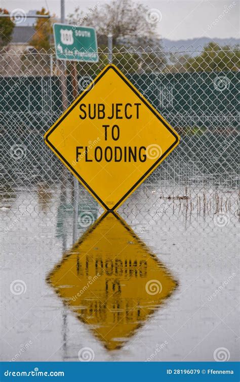 Subject To Flooding Sign And Reflection Stock Image Image Of Rain