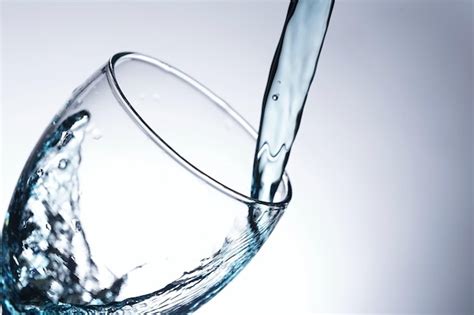 Premium Photo Image Of Pouring Water Into A Glass