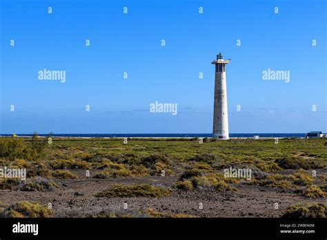 View Of Lighthouse Faro De Morro Jable On East Coast Of Peninsula