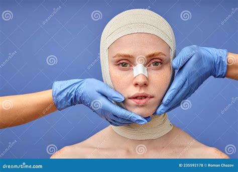 Female Standing With Naked Skin Touched By Doctor In Gloves Preparing