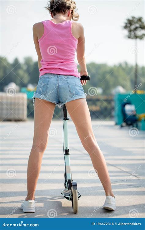 Close Up View Of Girl In Shorts With Beautiful Legs And Stock Photo