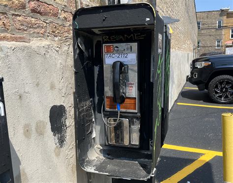 I made a payphone into a public interactive fiction installation that