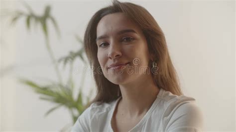 Flirty Girl Smiling In The Morning A Beautiful Brown Eyed Brunette Woman With A Sweet Smile