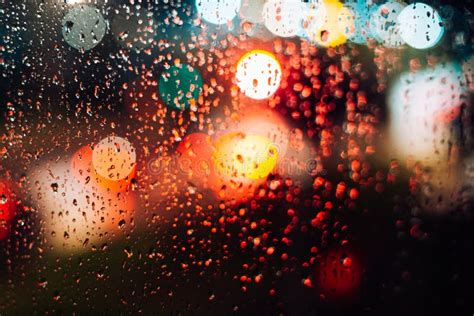 Abstract Defocus Background Night City Lights Through Wet Glass With