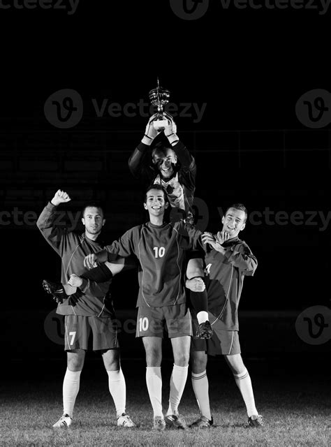 football players celebrating the victory 31052560 Stock Photo at Vecteezy