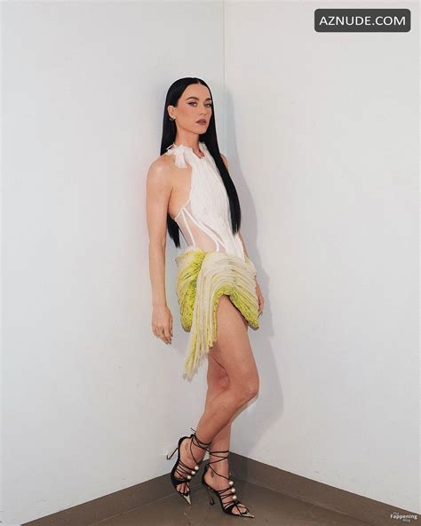 Katy Perry Sexy Photos And Video Showing Off Her Hot Legs And Sexually Eating A Giant Croissant