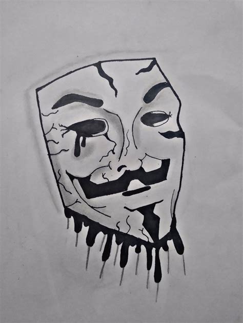 Es la mascara anonymous y es un dibujo a lápiz y plumón marcador hecho