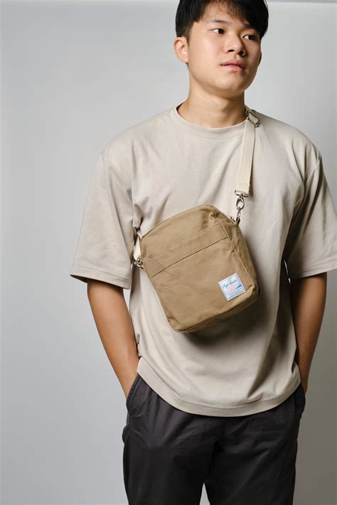 Small Canvas Messenger Travel Bag For Men Water Proof Lining With Multiple Easy Access Pockets