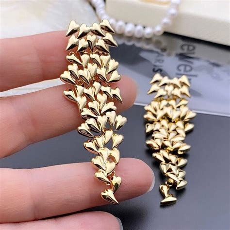 Серьги позолоченные каскад сердец 925 проба exclusive collection купить ...