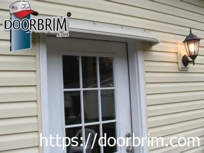 Exterior rain drip guard by DOORBRIM stops leaks and dripping.